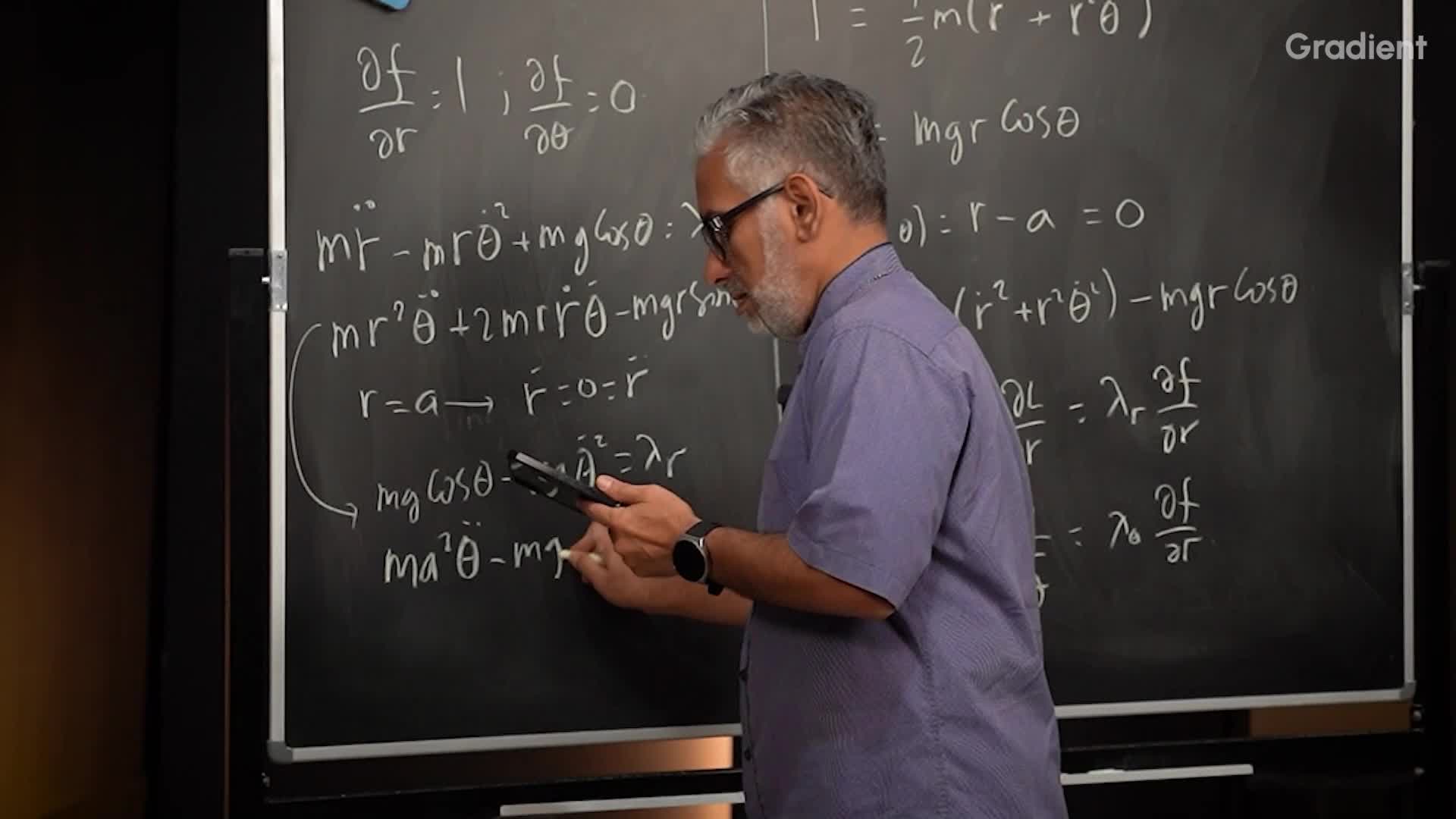 Partikel di Lintasan Setengah Lingkaran